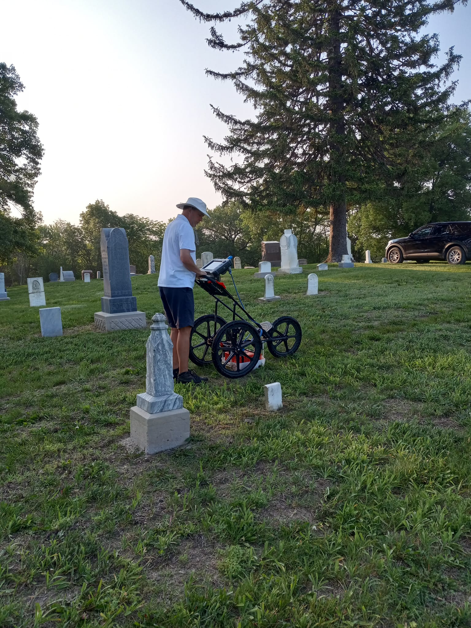 Searching for unmarked graves at Indian Valley Cemetery.